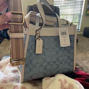Authentic COACH bag with tags attached and matching wallet